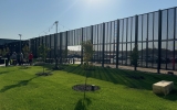 Perforated material surrounding a courtyard