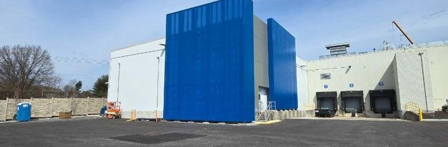 Blue perforated screening on an office building