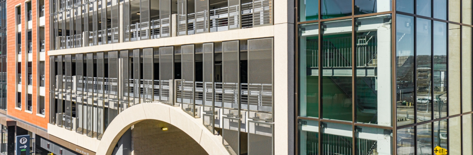 Side view of a perforated metal on a parking garage